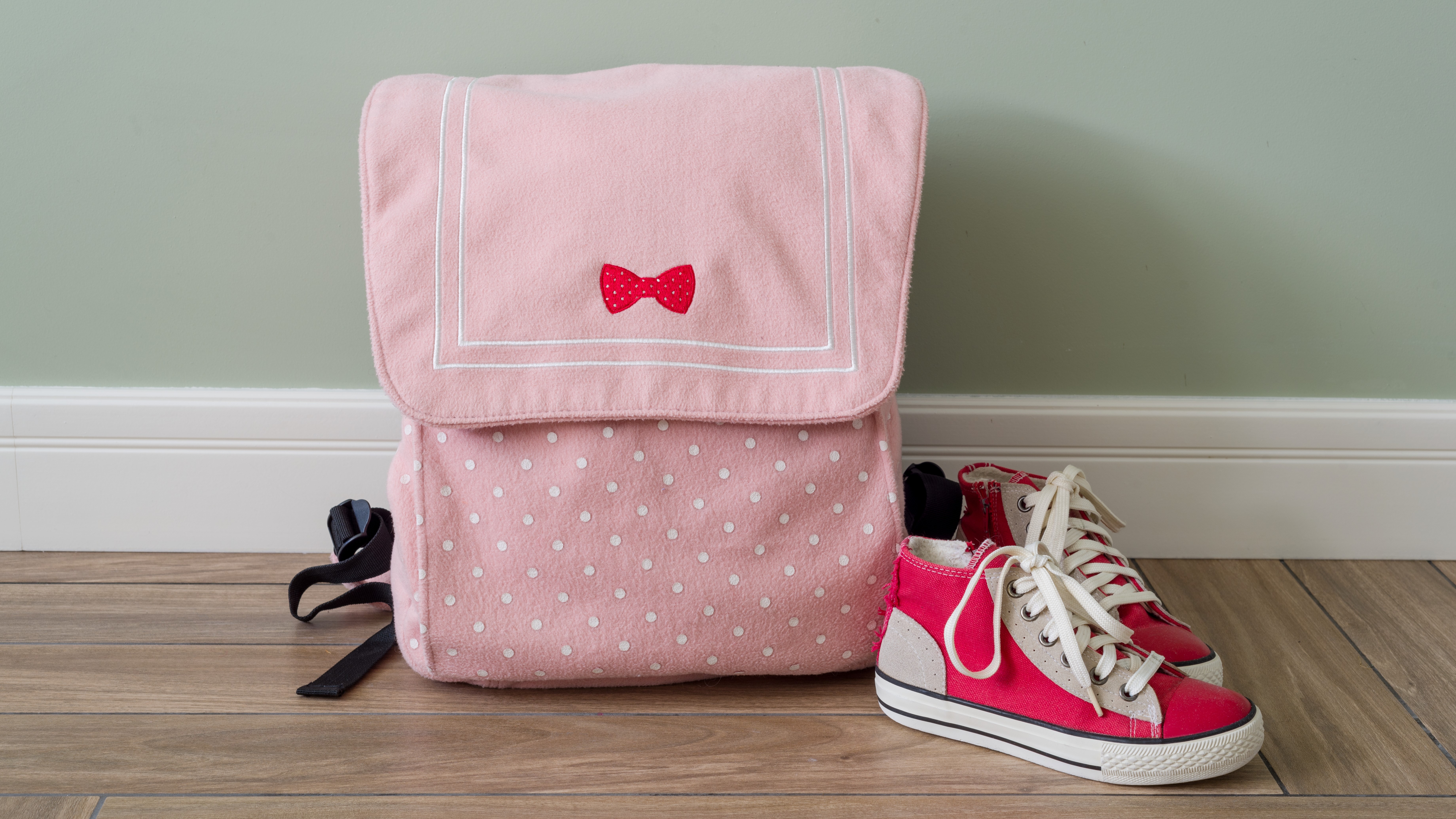 pink backpack and shoes